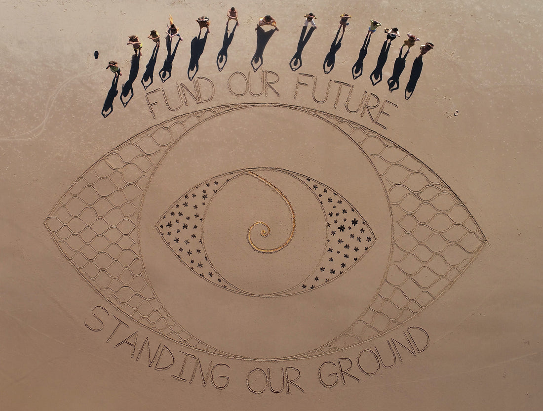 Beach artwork to protest the government's 'gas-fired recovery'
