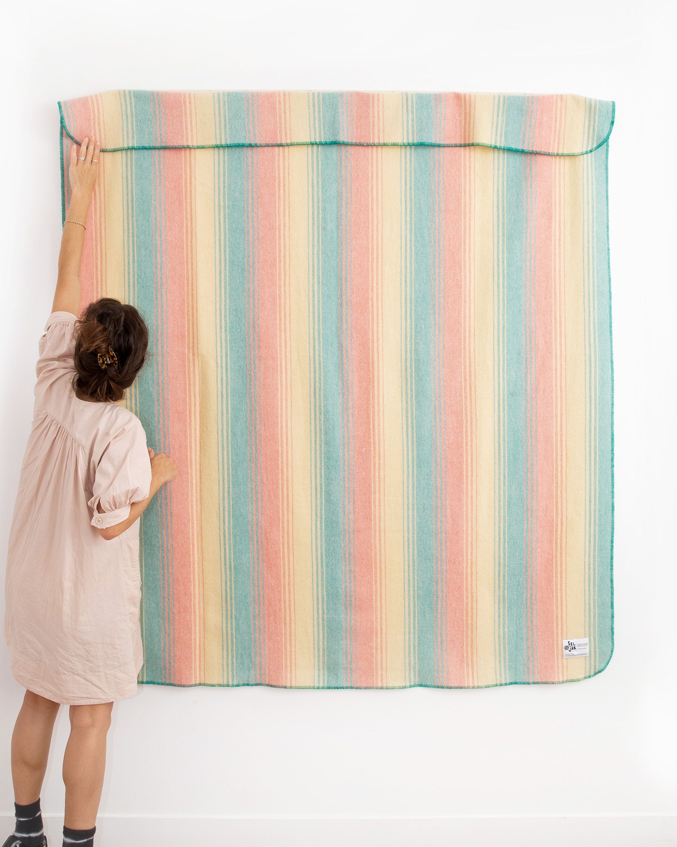 How to hang a blanket on the wall Seljak Brand